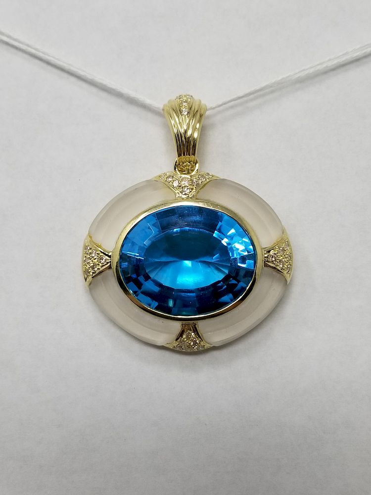 Appraisal: K Gold Blue Topaz Diamond Pendant K Gold Blue Topaz