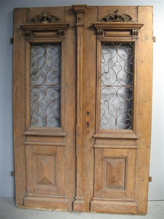 Appraisal: Two th century Italian pine and cast metal exterior doors