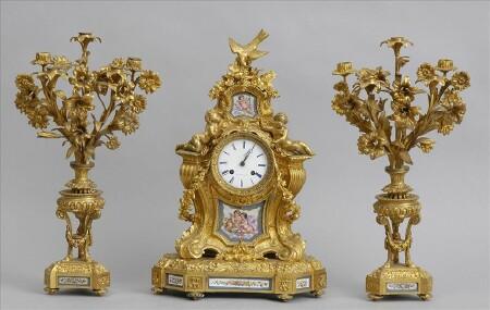 Appraisal: LOUIS XVI-STYLE PORCELAIN-MOUNTED GILT-BRONZE THREE-PIECE CLOCK GARNITURE Retailed by H