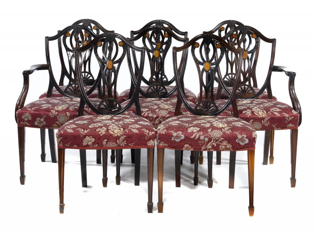 Appraisal: A SET OF EIGHT MAHOGANY DINING CHAIRS the shield shaped