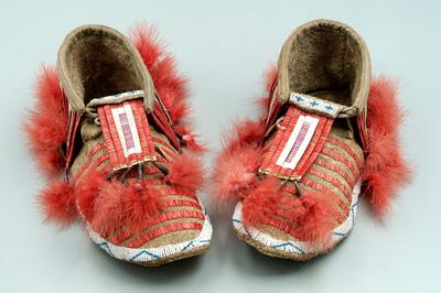 Appraisal: Pair quilled and beaded moccasins sinew sewn multi-colored bands of