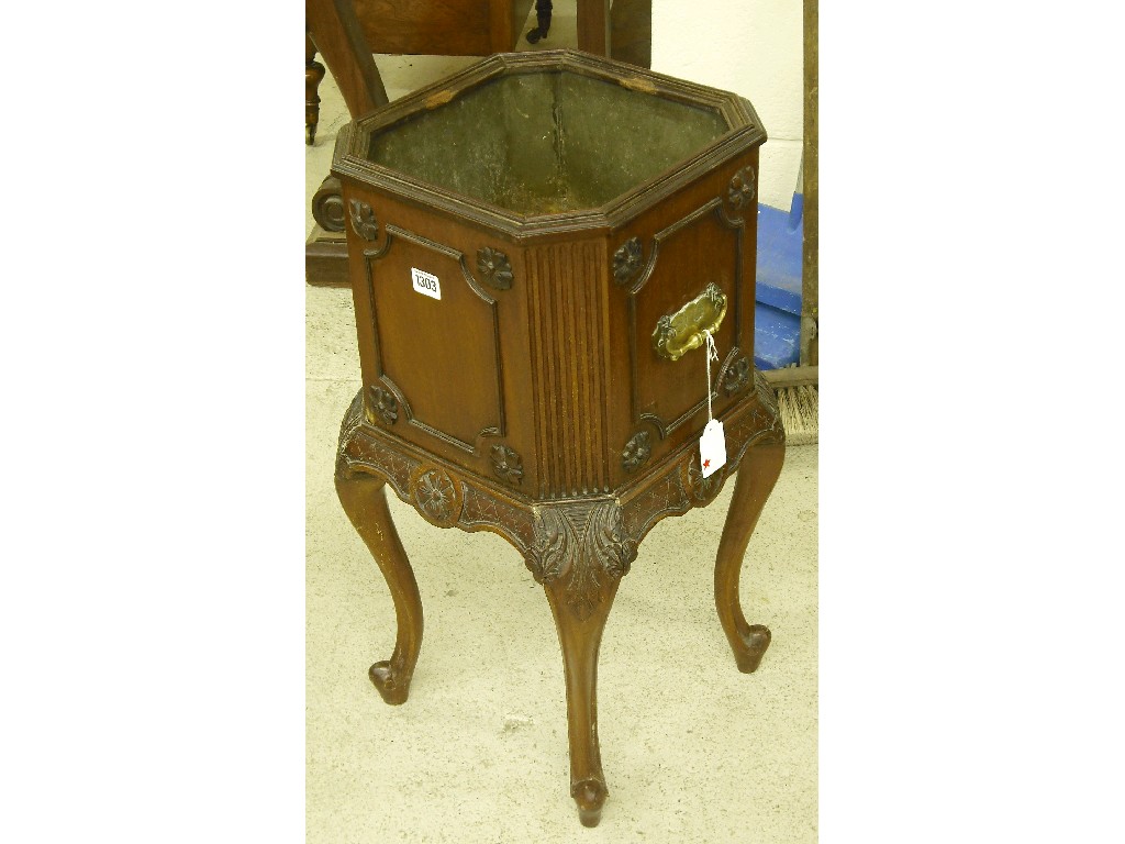 Appraisal: th century mahogany planter of square canted form the reed