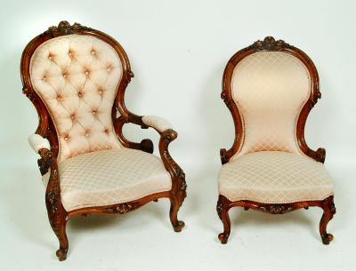 Appraisal: A VICTORIAN WALNUT FRAMED ELBOW CHAIR and a matching chair