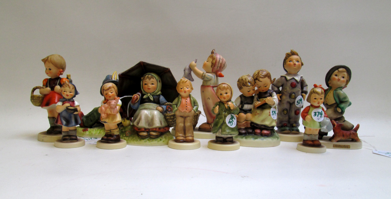 Appraisal: TWELVE HUMMEL FIGURINES trademarked -Present TM- through TM- Smiling Through