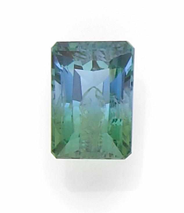 Appraisal: Unusual Bi-color Blue-Green Quartz BoliviaA fine rectangular-cut stone displaying almost