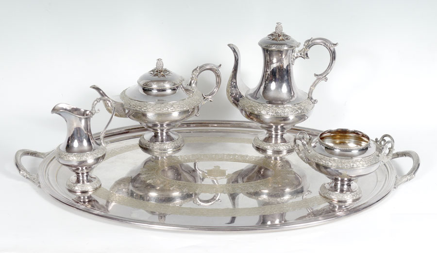 Appraisal: ARMORIAL SILVERPLATED COFFEE AND TEA SET ON TRAY Armorial emblem