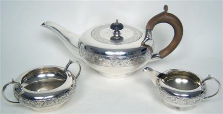 Appraisal: A matched three piece bachelor's teaset Birmingham and comprising teapot