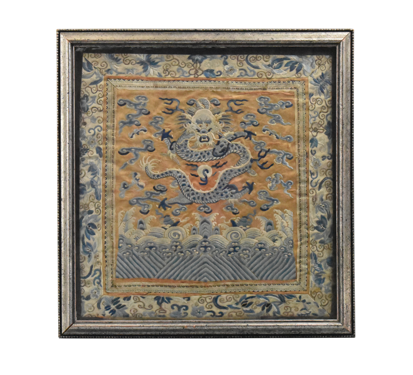 Appraisal: A Chinese framed embroidery dragon panel dating from the Qing