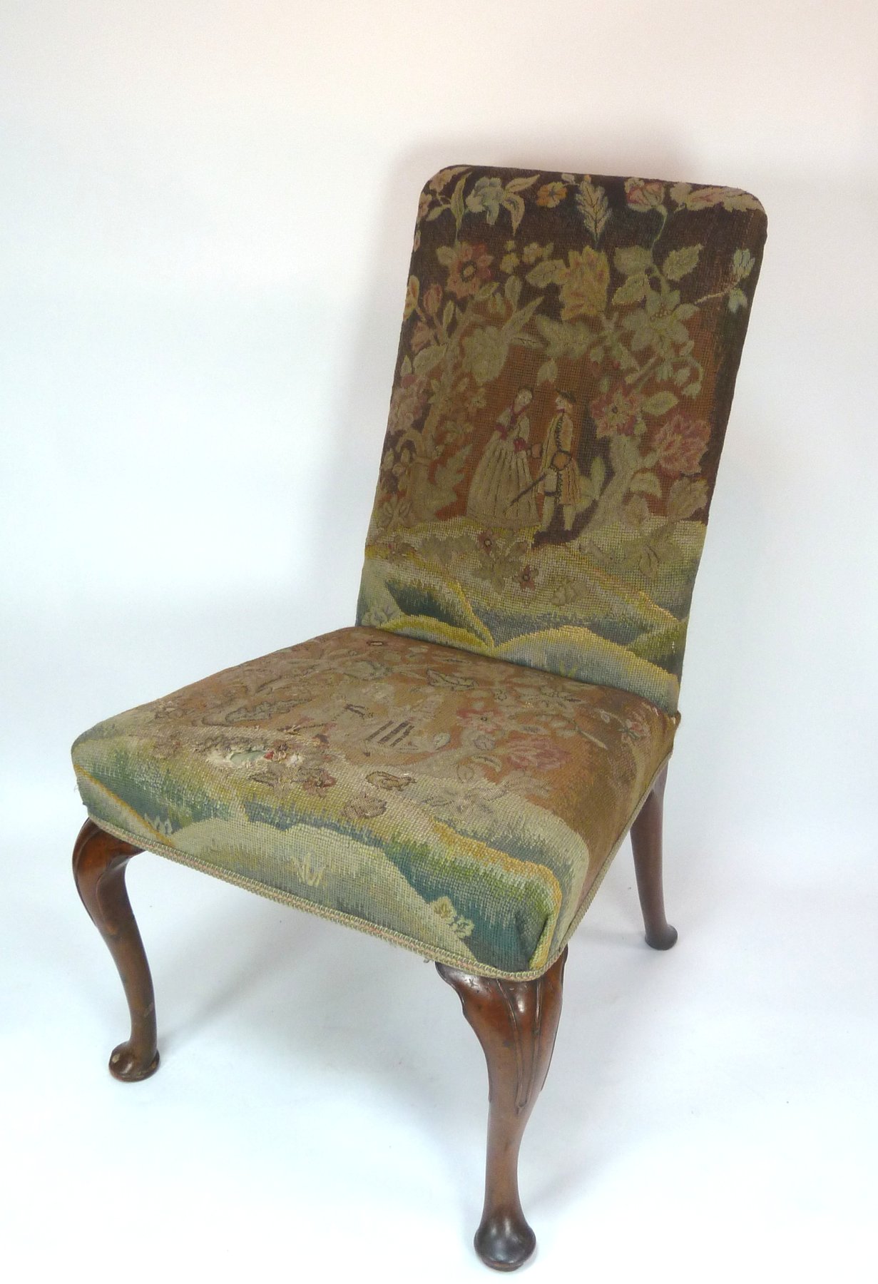 Appraisal: A Queen Anne walnut side chair with figural needlework back