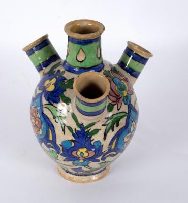 Appraisal: A th Century Middle Eastern glazed earthenware tulip vase cm