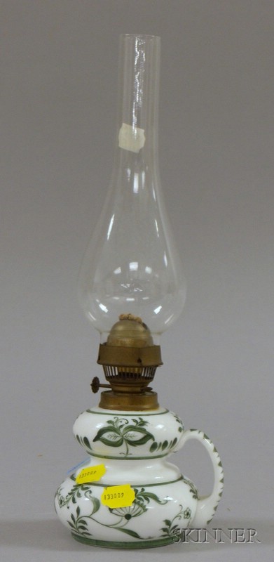 Appraisal: Green and White Onion Pattern Enameled Glass Oil Lamp ht