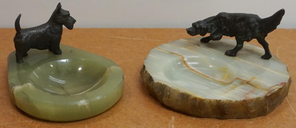 Appraisal: Two Onyx Ashtrays with Metal Dog Figures W of Each