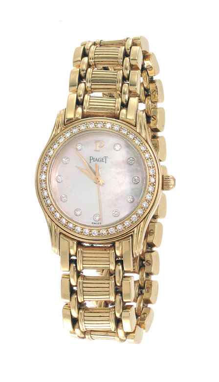 Appraisal: K GOLD PIAGET LADIES DIAMOND BEZEL WATCH K solid yellow