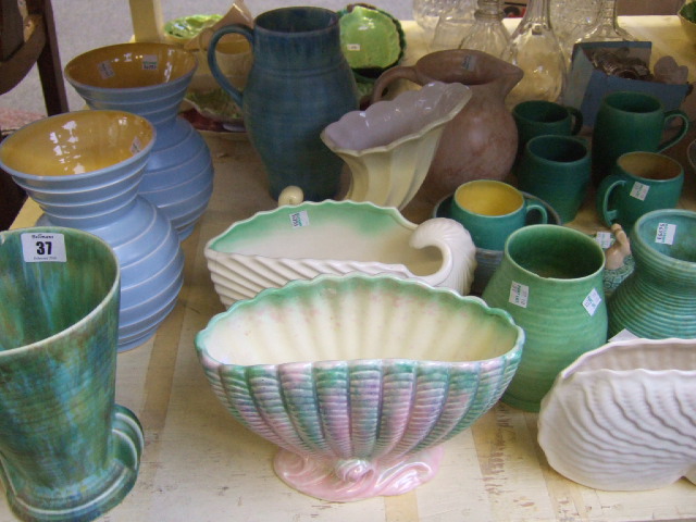 Appraisal: A quantity of stoneware jugs mugs jardinieres and vases by