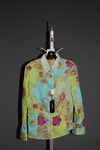 Appraisal: Akris cotton long sleeve blouse green pink print button front