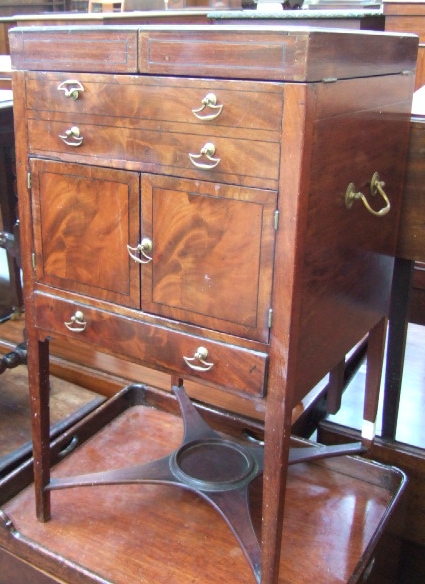 Appraisal: A th century gentleman's wash stand the fitted interior with