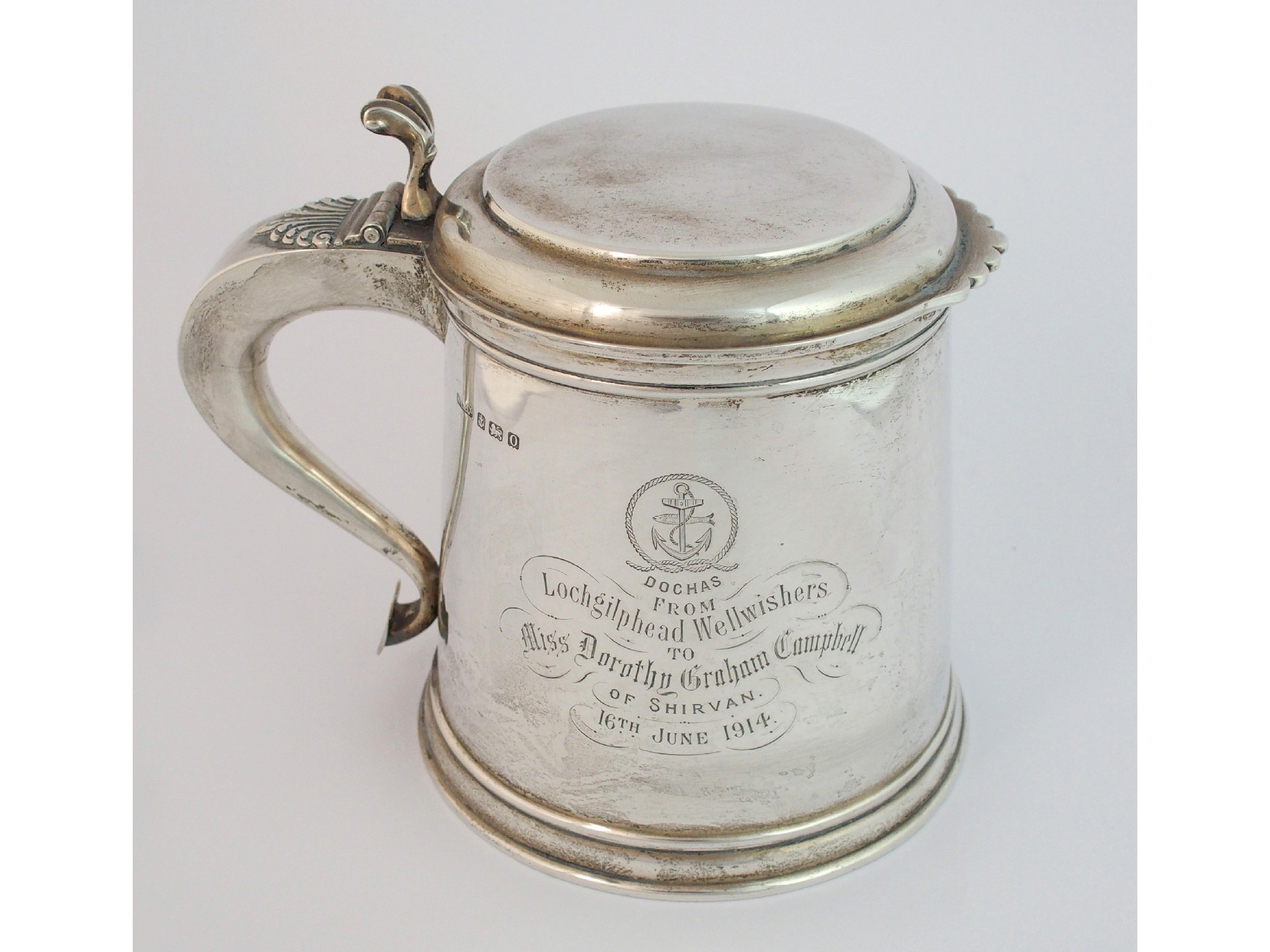 Appraisal: A silver lidded tankardmaker's marks H L Co Birmingham of