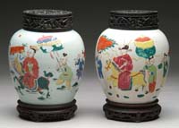 Appraisal: TWO EARLY CHINESE COVERED JARS The jars decorated with Mandarin