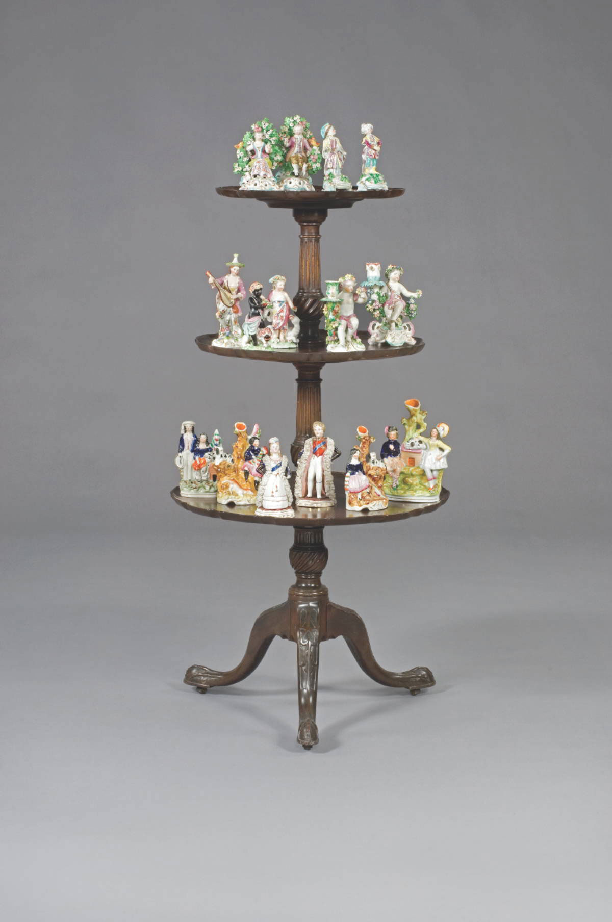 Appraisal: PAIR OF STAFFORDSHIRE FIGURES OF A ROYAL COUPLE CIRCA -