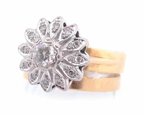 Appraisal: A DIAMOND FLORAL STYLE CLUSTER RING WITH MATCHING WEDDER IN