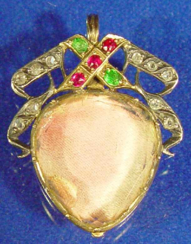 Appraisal: Victorian gold diamond emerald ruby and crystal heart shaped locket