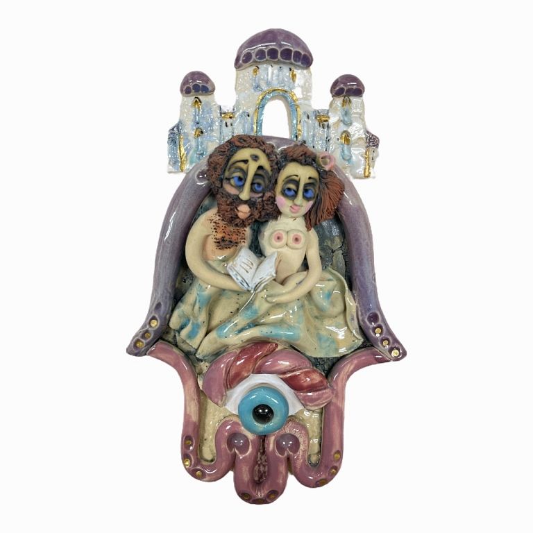 Appraisal: Ceramic Hamsa Marked on the back LOMBROZO depicting a couple