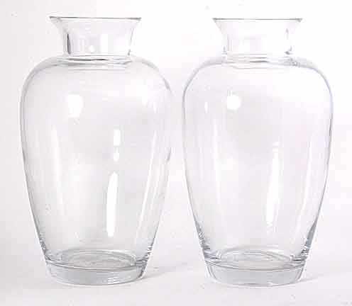 Appraisal: Pair Eurasian oversized glass vases colorless glass Classical urn forms