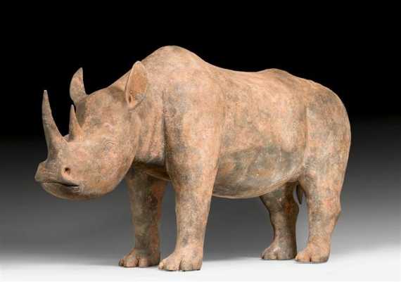 Appraisal: AN EXCEPTIONALLY LARGE POTTERY FIGURE OF A RHINO China Han