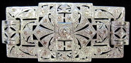 Appraisal: Platinum and diamond bar broochFiligree style motif accented by petite