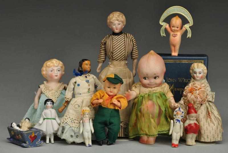 Appraisal: Lot of Assorted Small Dolls Description All bisque Kewpie probably