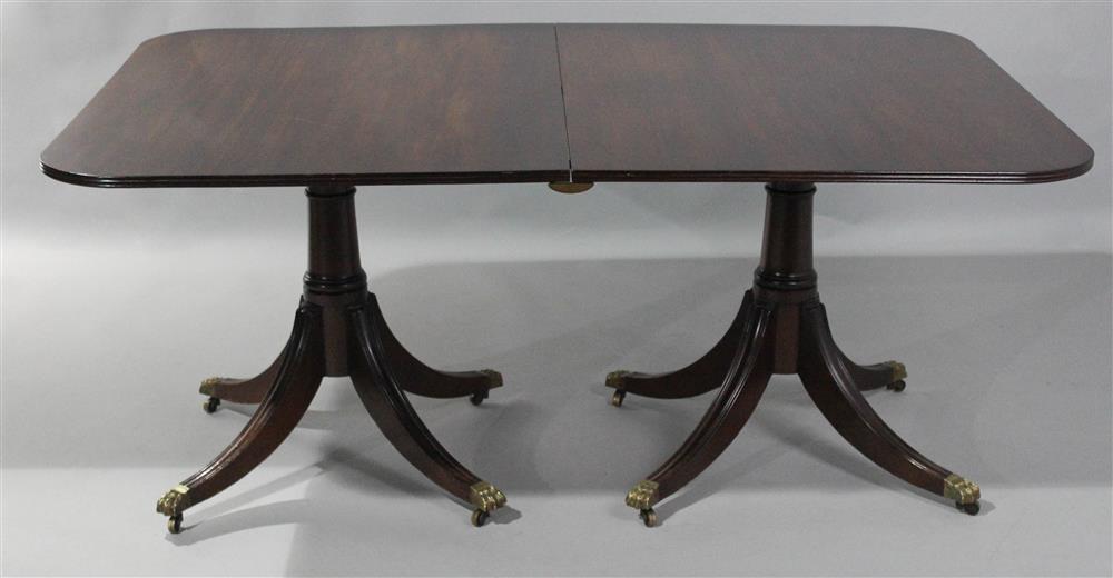 Appraisal: REGENCY STYLE DOUBLE PEDESTAL MAHOGANY DINING TABLE the rectangular table