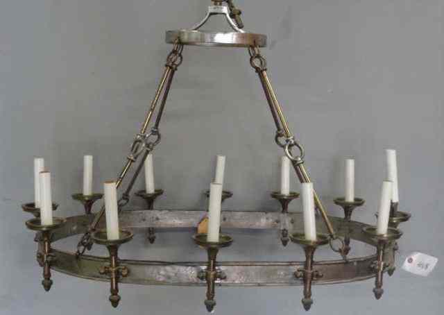 Appraisal: Oval Brass Light Chandelier From a Manhattan lighting business now