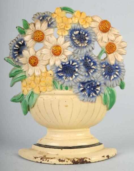 Appraisal: Cast Iron Daisy Bowl Doorstop Description Made by Hubley Condition