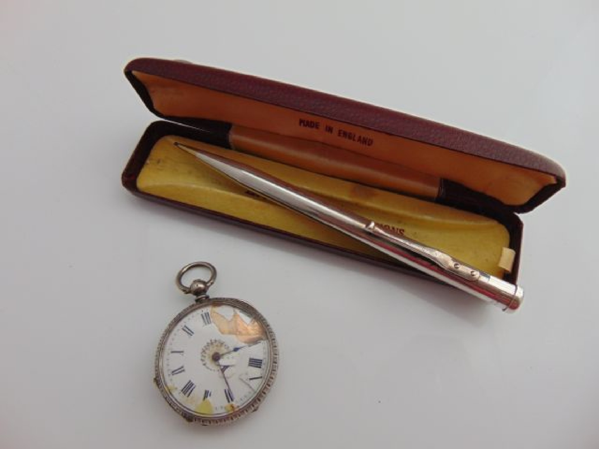 Appraisal: A Continental silver open-faced pocket watch standard the white enamelled