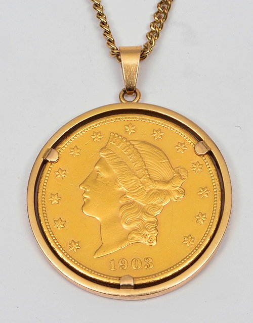 Appraisal: US twenty dollar gold coinset as a pendant in ct