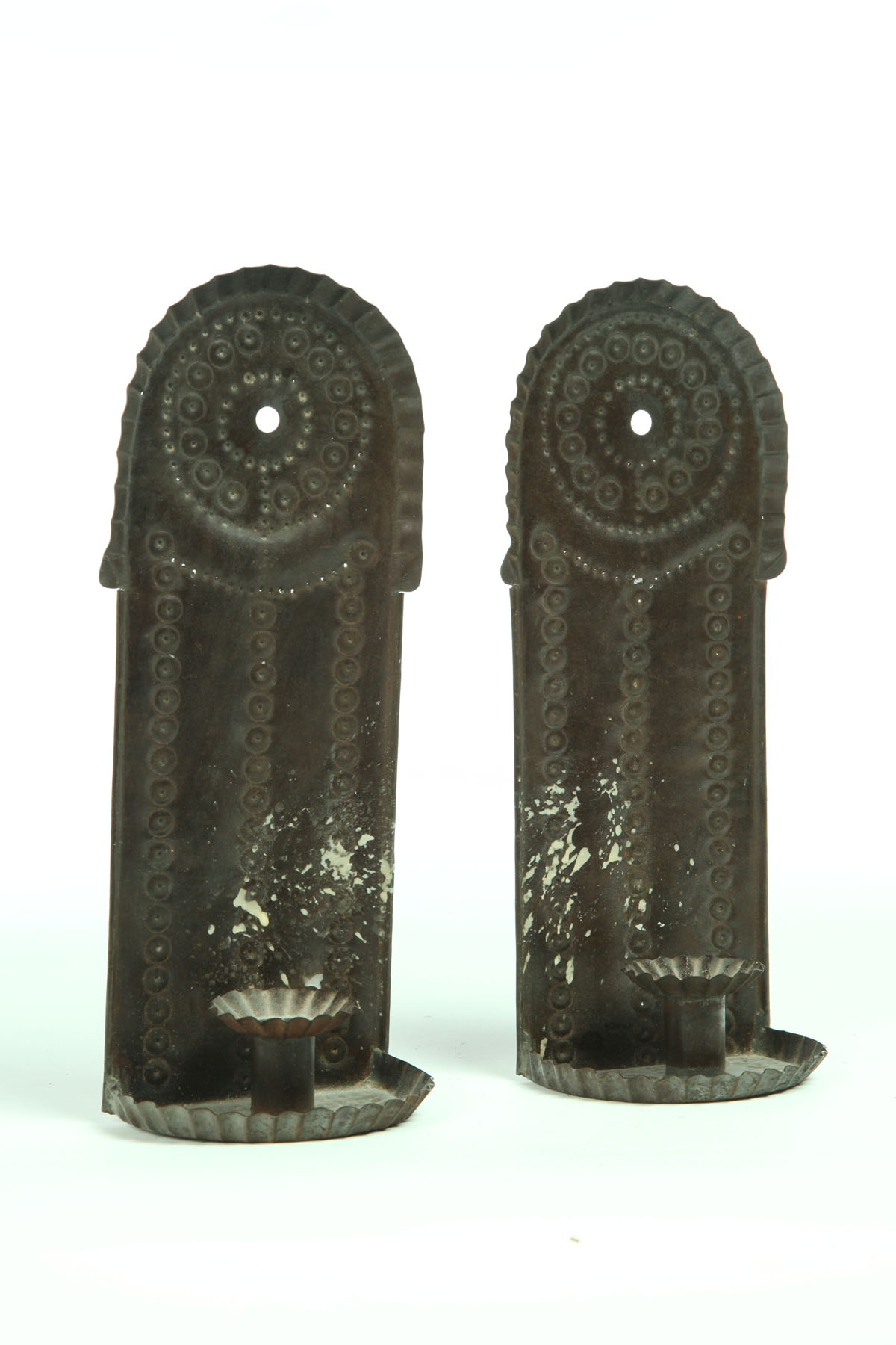 Appraisal: PAIR OF WALL SCONCES American th century tin Tooled sconces