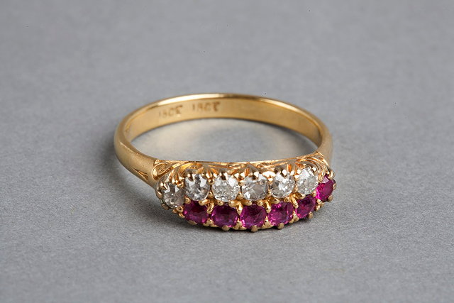 Appraisal: A RUBY AND DIAMOND SET DRESS RING two rows of