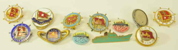 Appraisal: GROUPING OF ENAMEL PINS Small scale colorful pins each depicting