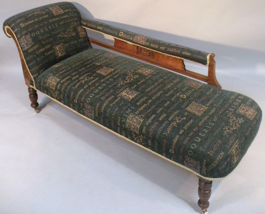 Appraisal: An Edwardian carved oak chaise longue upholstered in later material