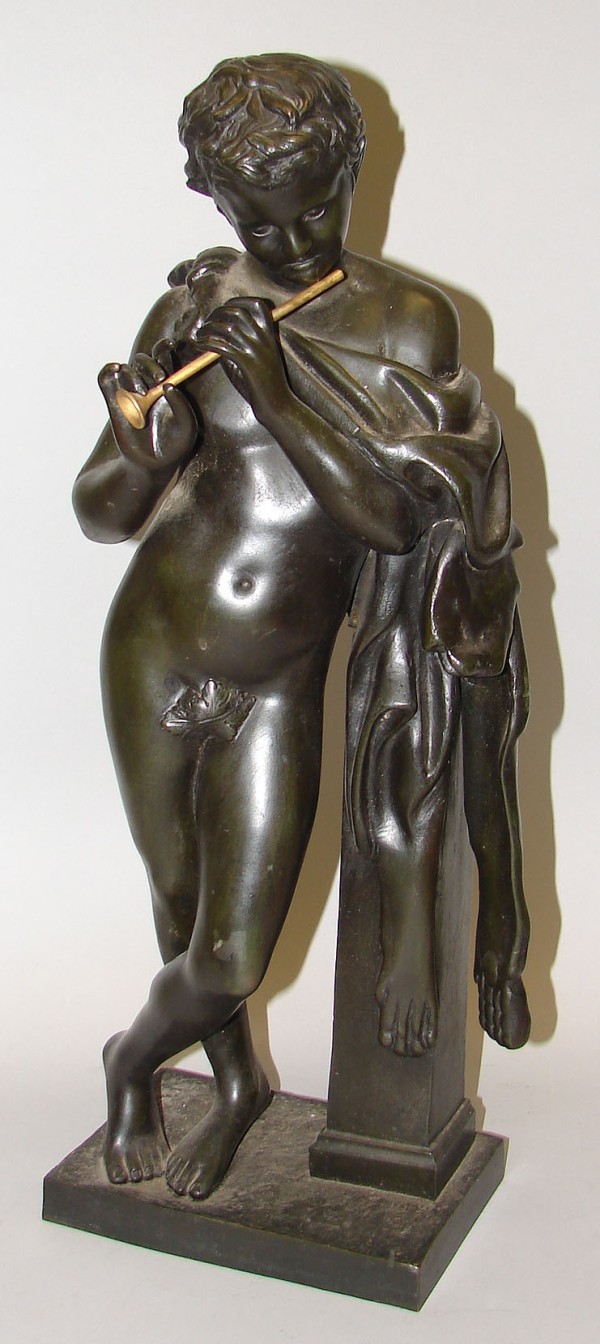 Appraisal: Classical bronze figure leaning against a column playing a horn