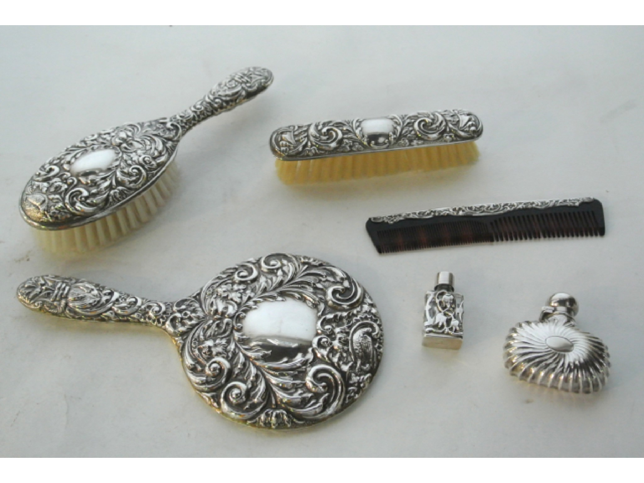 Appraisal: A silver-mounted dressing set W I Broadway Co Birmingham comprising