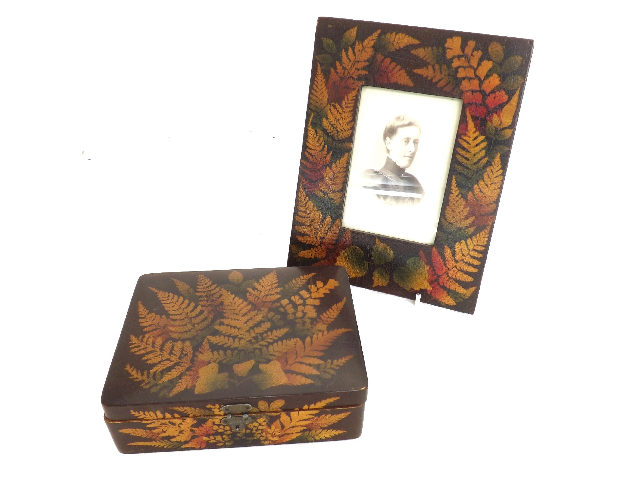 Appraisal: Fern ware - rectangular frame inset with a photographic portrait