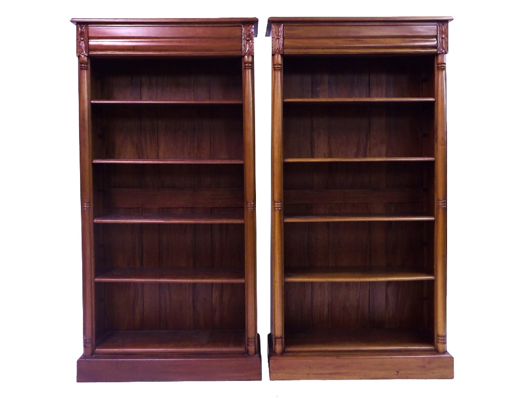 Appraisal: Pair of modern hardwood freestanding bookcases fitted with a cushion