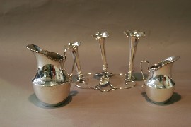 Appraisal: A Victorian posy holder in silver plate with three trumpet