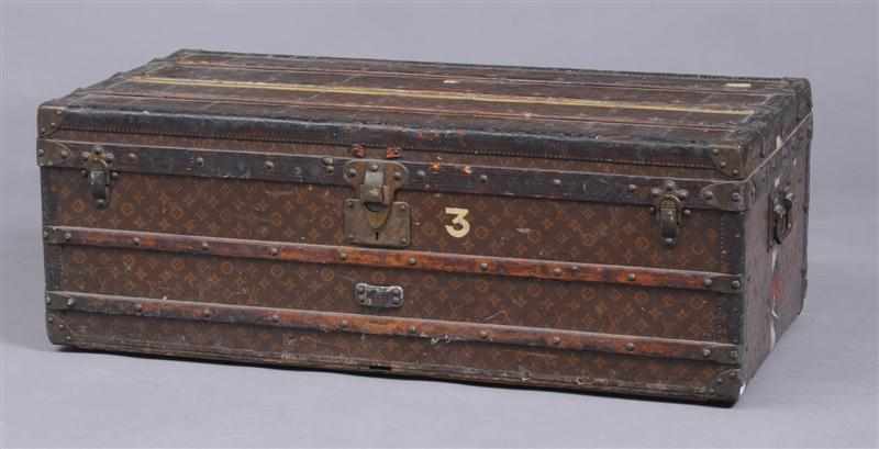 Appraisal: VINTAGE LOUIS VUITTON TRUNK With brass handles locks wood slatted