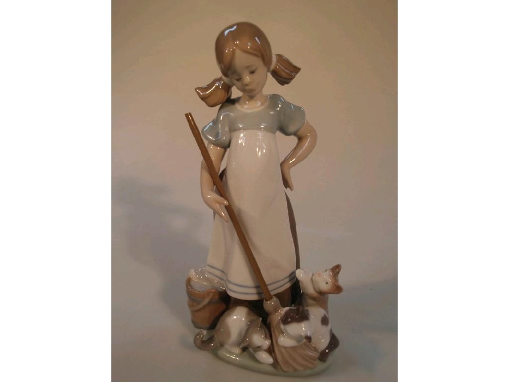 Appraisal: A Lladro figure of a girl with playful kittens cm