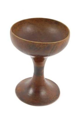 Appraisal: A Philippines wooden pedestal bowl with a horn central section