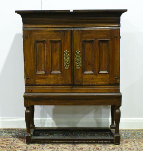 Appraisal: An th century Swedish pine two-door cabinet on stand cm