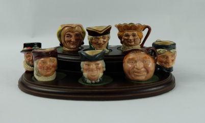 Appraisal: A set of Royal Doulton tiny character jugs comprising Granny