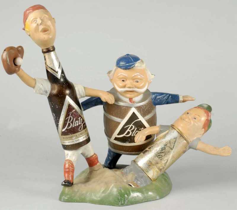 Appraisal: Metal Blatz Advertising Beer Piece Description Three comical fellows with